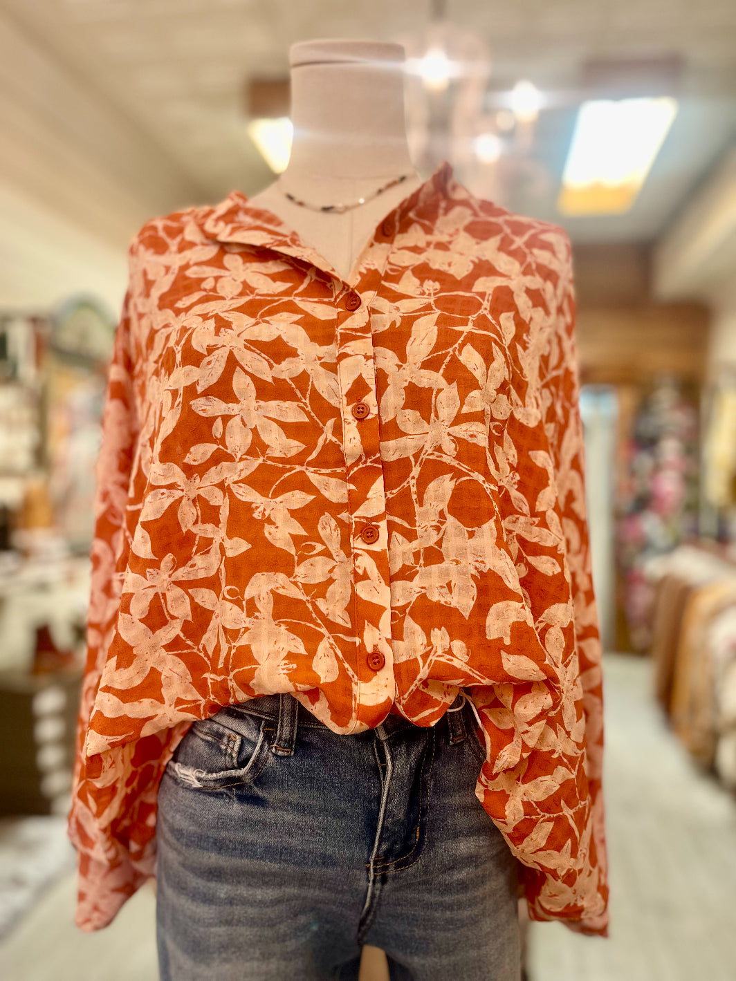 Jodifl: Orange Leaves Print Blouse